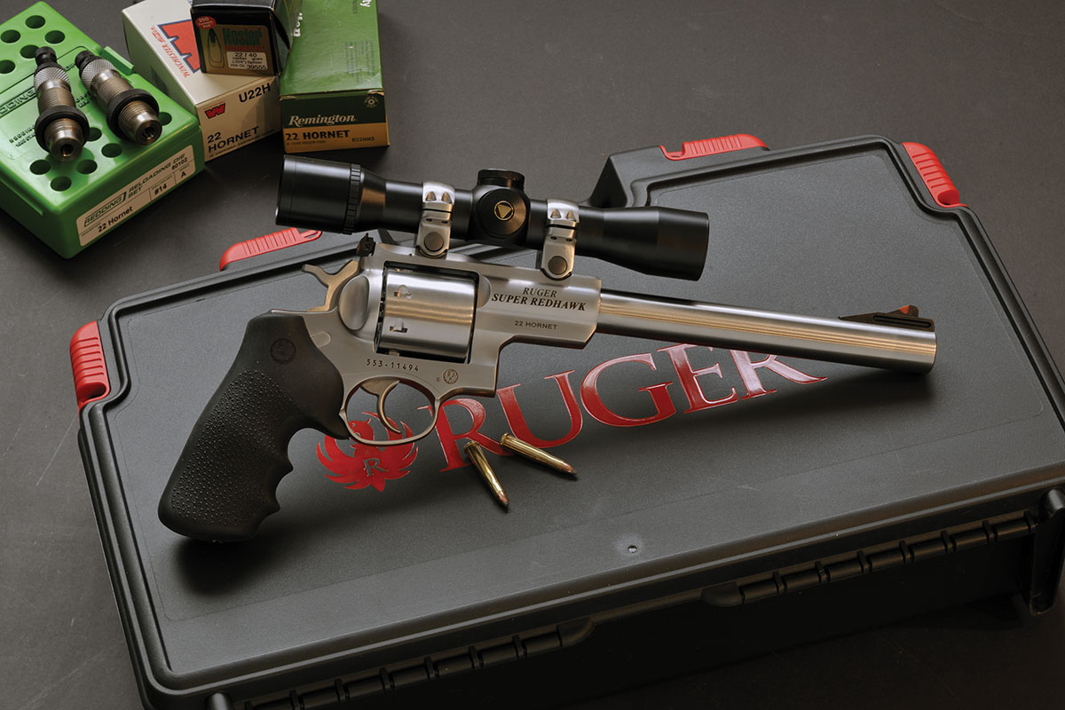 A Ruger Super Redhawk with a Bausch & Lomb 4x scope mounted in Ruger rings.